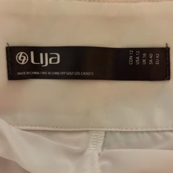 Lija tennis/golf skirt, lined. Bright salmon color, size 12 - Picture 3 of 6
